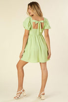 Tie back dress with puff sleeves - Guy Christopher 