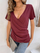 Button Detail Surplice Short Sleeve Tee - Embrace Your Romantic Side with this Chic and Sophisticated Piece - Accentuates Your Figure in all the Right Places. - Guy Christopher