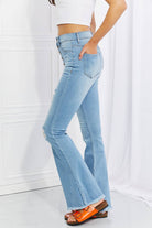 "Captivate Hearts with the Vibrant MIU Full Size Jess Button Flare Jeans - Unleash Effortless Chic and Distressed Allure for a Breathtakingly Beautiful Look" - Guy Christopher