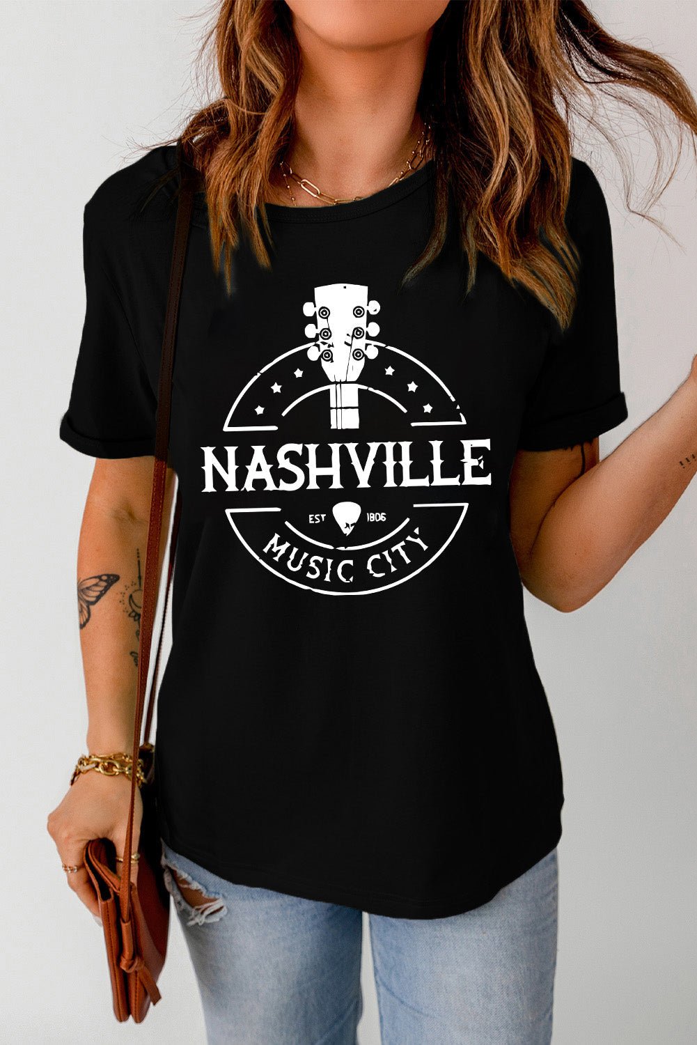 Captivate Your Heart with the Western Nashville Music City Cuffed Graphic Tee Shirt - Embrace the Beauty of Nashville's Western Culture and Experience Sublime Comfort All Day Long. - Guy Christopher
