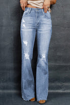 Distressed Raw Hem Flare Jeans - Guy Christopher