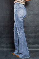 Distressed Raw Hem Flare Jeans - Guy Christopher