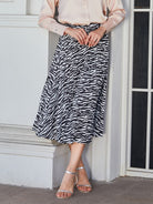 Double Take Animal Print Pleated Midi Skirt - Guy Christopher