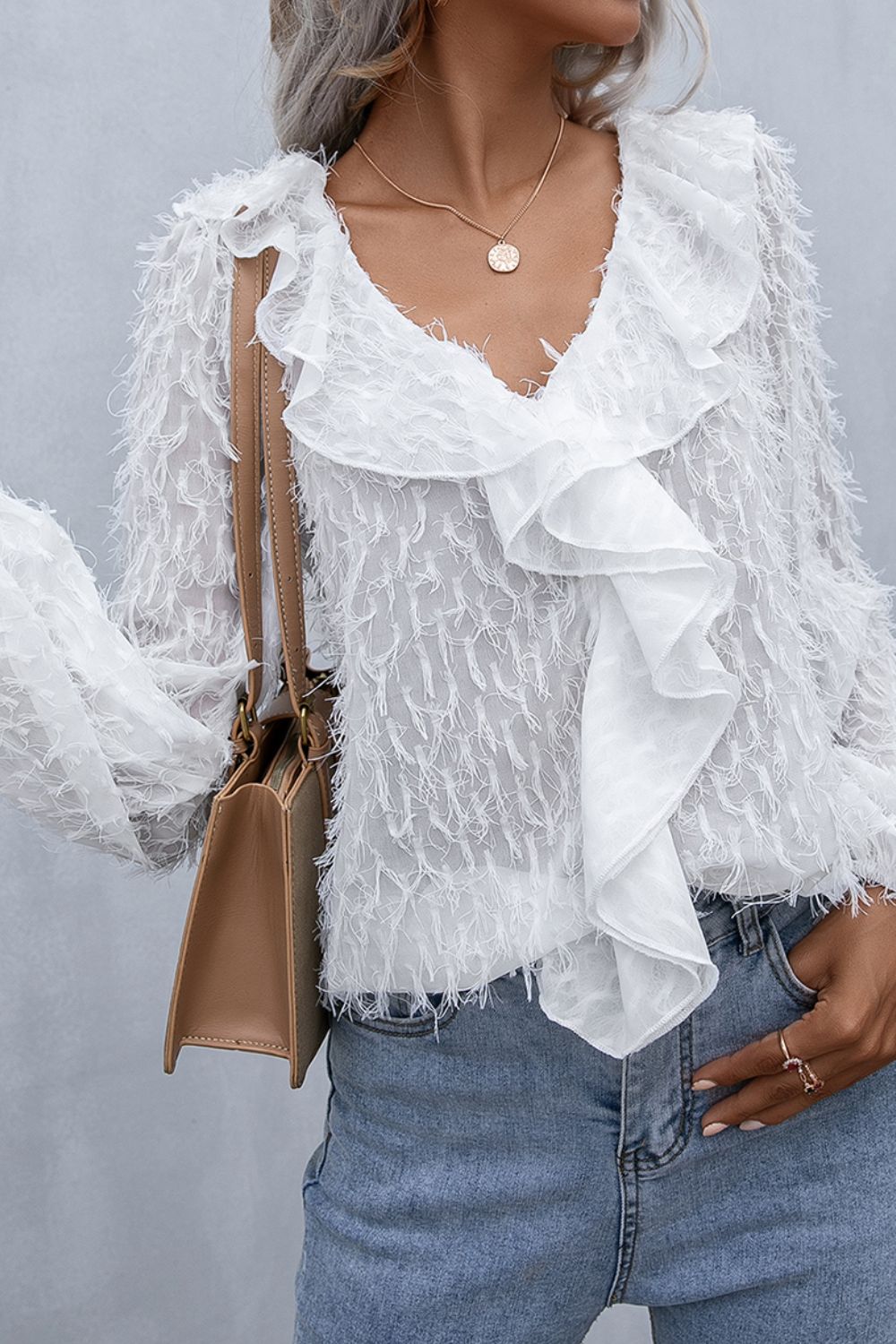 Double Take Ruffle Hem Fringe V-Neck Balloon Sleeve Blouse - Guy Christopher