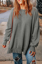 Dropped Shoulder Round Neck Long Sleeve Blouse - Guy Christopher