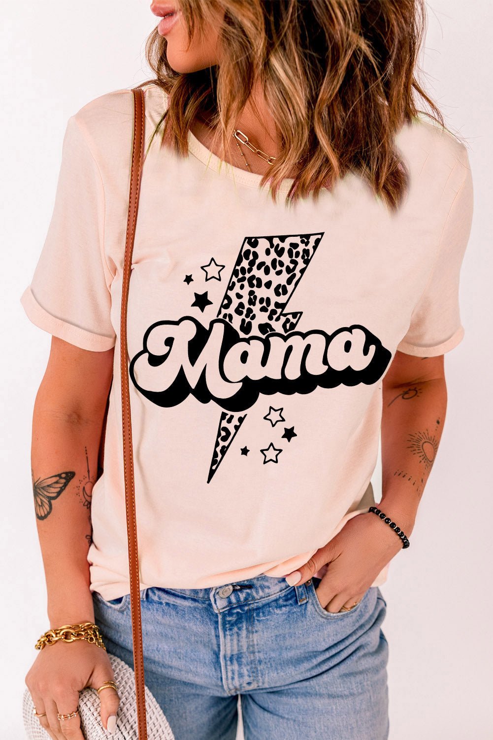 "Embrace the Goddess Within with MAMA's Lightning Graphic Tee - Let Your Playful Charm Sparkle in this Soft and Flattering Piece" - Guy Christopher