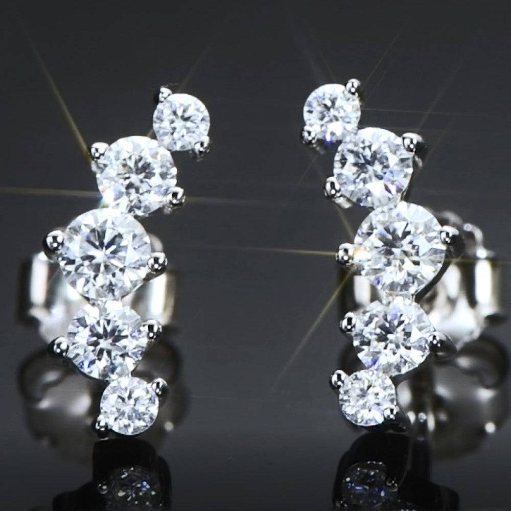 "Enchanted Love - Embrace Eternal Elegance with All You Need Moissanite Platinum-Plated Earrings" - Guy Christopher