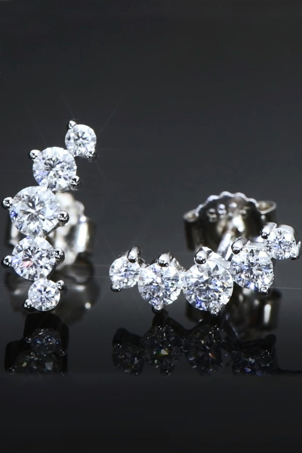 "Enchanted Love - Embrace Eternal Elegance with All You Need Moissanite Platinum-Plated Earrings" - Guy Christopher