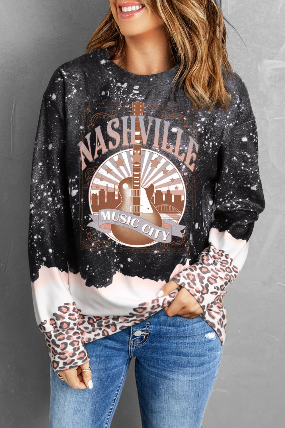 "Enchanting Nashville Nights" - Embrace the city's musical spirit with our Nashville Music City Graphic Sweatshirt - Let its stunning skyline and leopard print background leave an indelible impression on your senses, while enhancing your natural beauty. - Guy Christopher