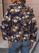Floral Notched Balloon Sleeve Blouse - Guy Christopher