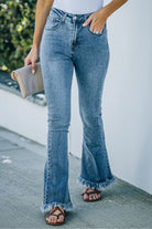 Frayed Hem Flare Jeans - Guy Christopher