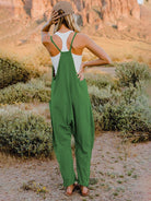 Full Size Sleeveless V-Neck Pocketed Jumpsuit - Guy Christopher