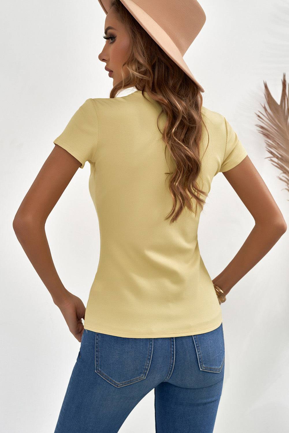 Indulge in the Beauty of Simplicity with Our Buttoned Short Sleeve Tee Shirt - Effortless Glamour That Hugs Your Curves and Accentuates Your Natural Beauty. - Guy Christopher