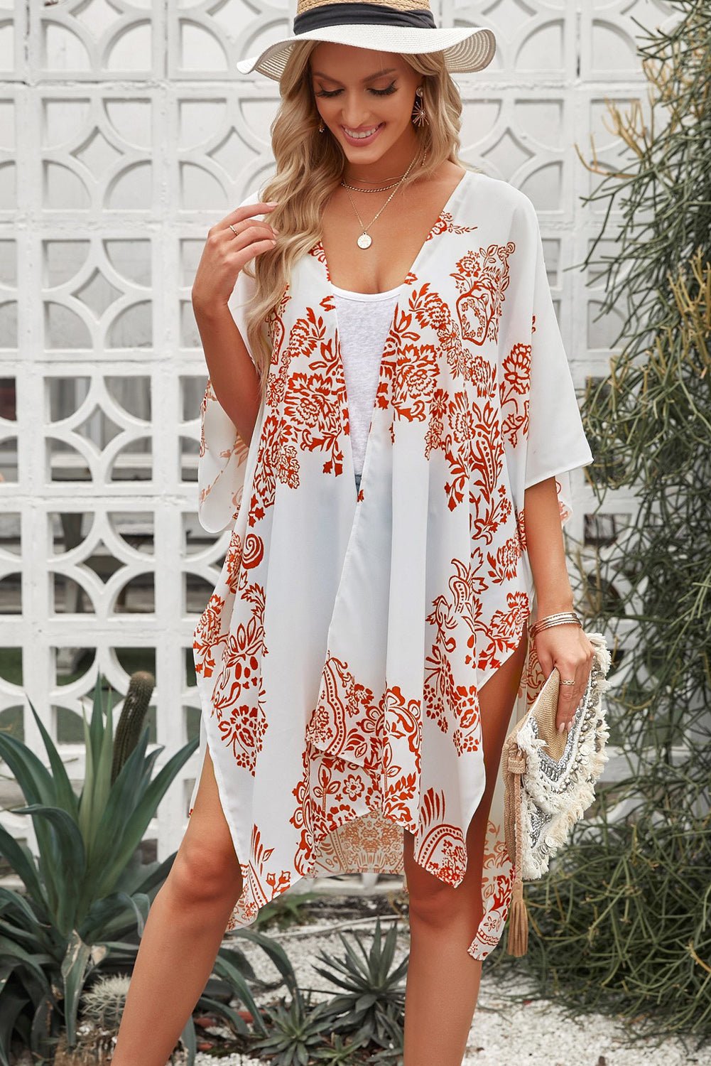 Indulge in the Luxurious Feel of Romance - Our Floral Side Slit Cover Up Will Transport You to a World of Beauty and Elegance, Elevating Your Feminine Style with Every Step. - Guy Christopher