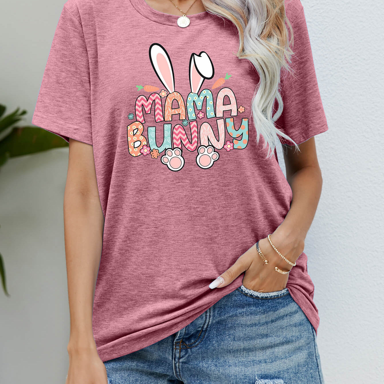 "MAMA BUNNY Easter Graphic Short Sleeve Tee - Embrace the Joy of Easter with this Whimsical Tee - Unleash Your Inner Romantic" - Guy Christopher