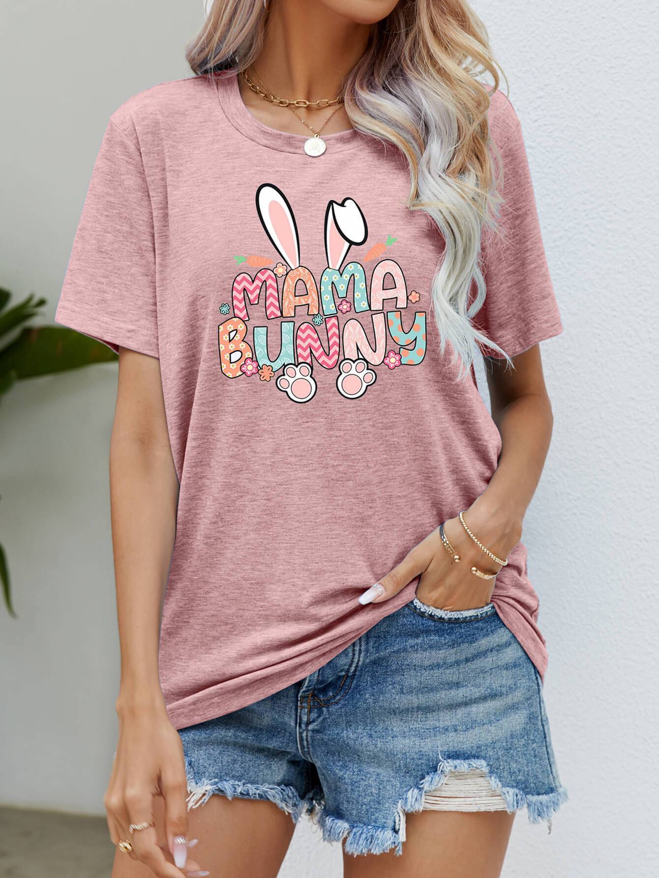 "MAMA BUNNY Easter Graphic Short Sleeve Tee - Embrace the Joy of Easter with this Whimsical Tee - Unleash Your Inner Romantic" - Guy Christopher