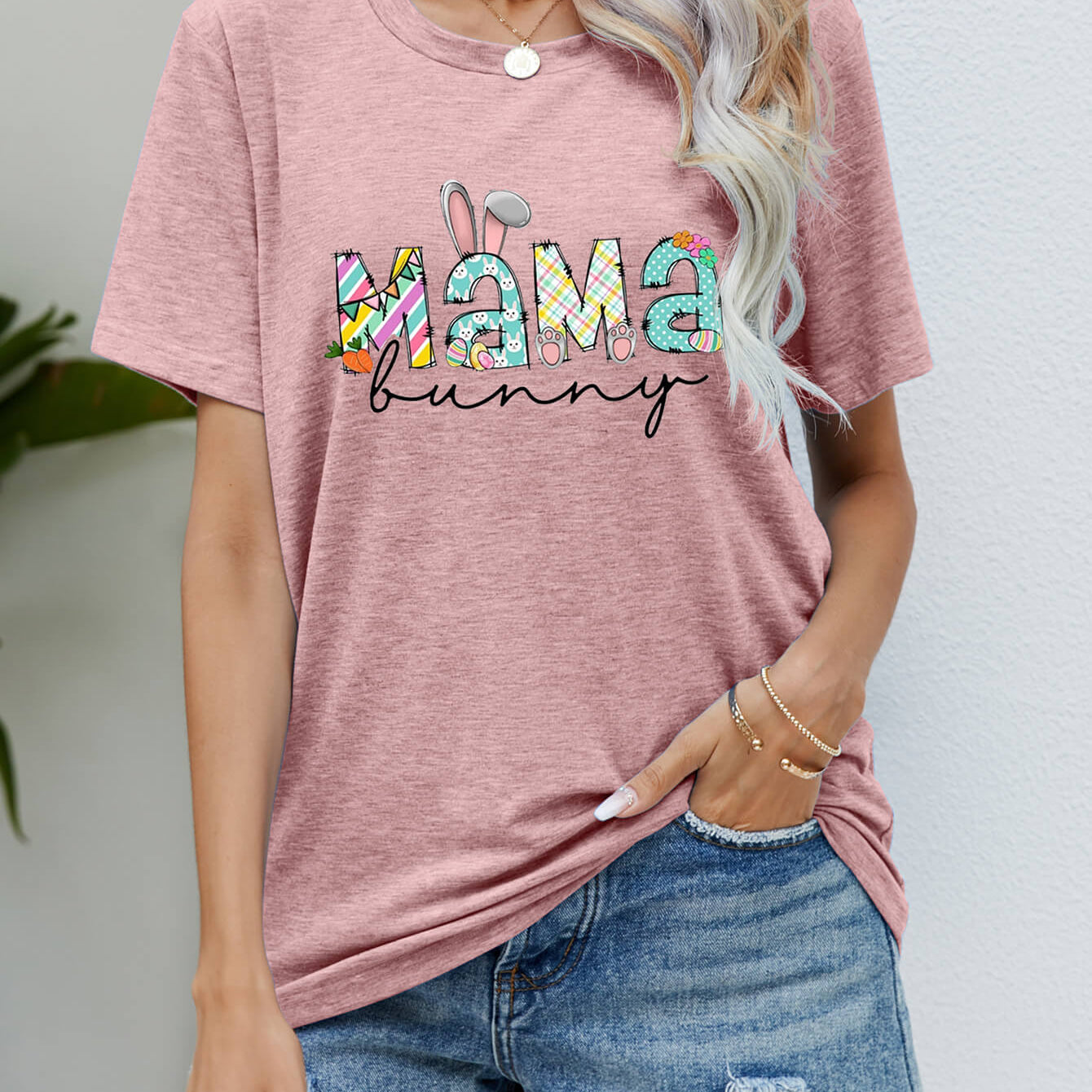 "MAMA BUNNY Easter Graphic Tee - Embrace Love and Joy this Easter Season with our Soft and Sweet Design - Wrap Yourself in Comfortable Elegance" - Guy Christopher