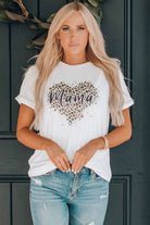 "MAMA Leopard Heart Graphic Tee Shirt - Embrace Your Wild Side and Celebrate the Eternal Bond Between a Mother and Child - Indulge in Graceful Comfort" - Guy Christopher