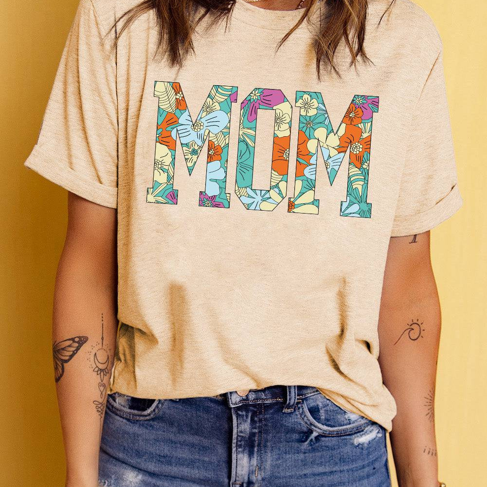 "MOM Floral Graphic T-Shirt - Express Your Love with Elegance and Comfort - A Perfect Gift for Cherishing Precious Moments Together" - Guy Christopher