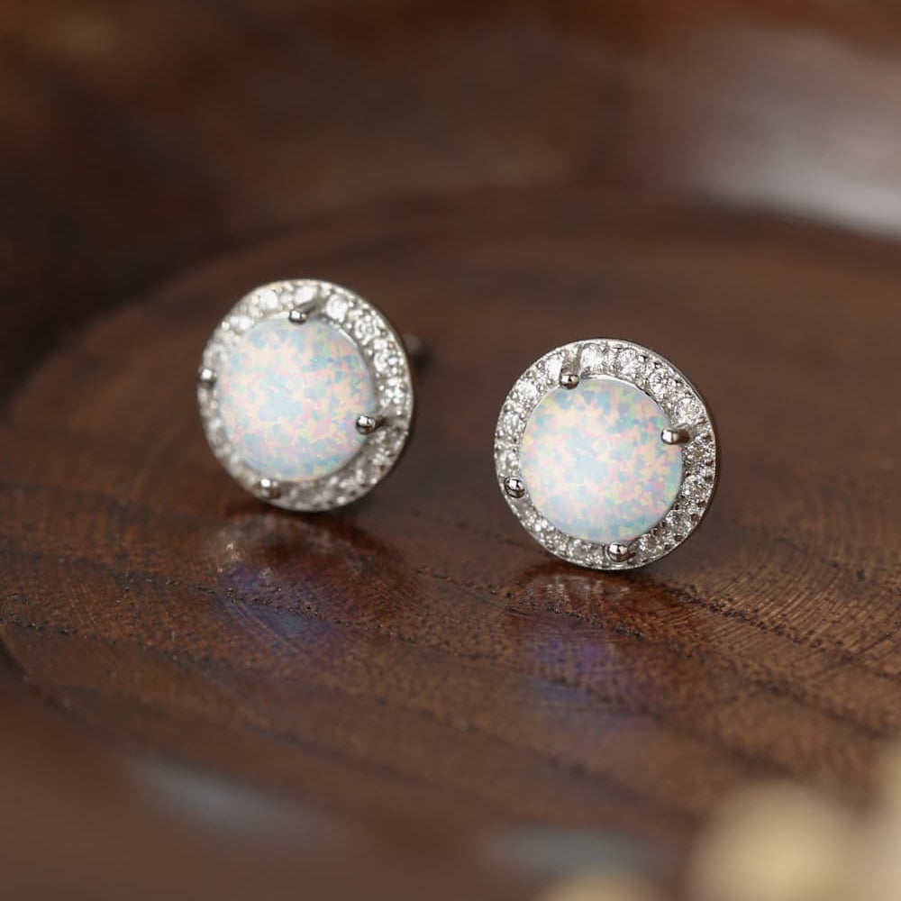 "Opulent Radiance - Let the Mesmerizing Hues of Australian Opal Earrings Illuminate Your Love Story" - Guy Christopher