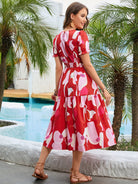 Printed Round Neck Flounce Sleeve Midi Dress - Guy Christopher