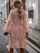 Printed Round Neck Long Sleeve Smocked Dress - Guy Christopher