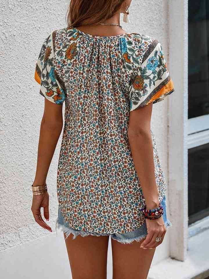 Printed Short Sleeve Tie Neck Blouse - Guy Christopher