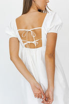 SHORT SLEEVE BACK TIE DETAIL BABYDOLL DRESS - Guy Christopher