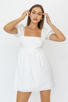 SHORT SLEEVE BACK TIE DETAIL BABYDOLL DRESS - Guy Christopher