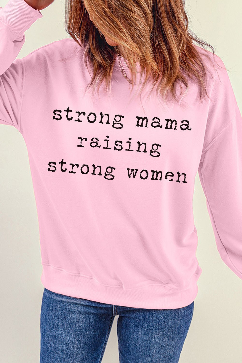 "Strong Mama Raising Strong Women Graphic Sweatshirt - A Tribute to Motherhood and Femininity, Celebrating the Unbreakable Bond with Your Little Girls" - Guy Christopher