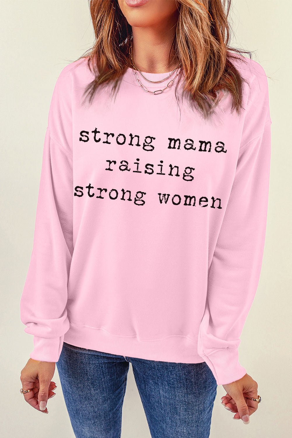 "Strong Mama Raising Strong Women Graphic Sweatshirt - A Tribute to Motherhood and Femininity, Celebrating the Unbreakable Bond with Your Little Girls" - Guy Christopher